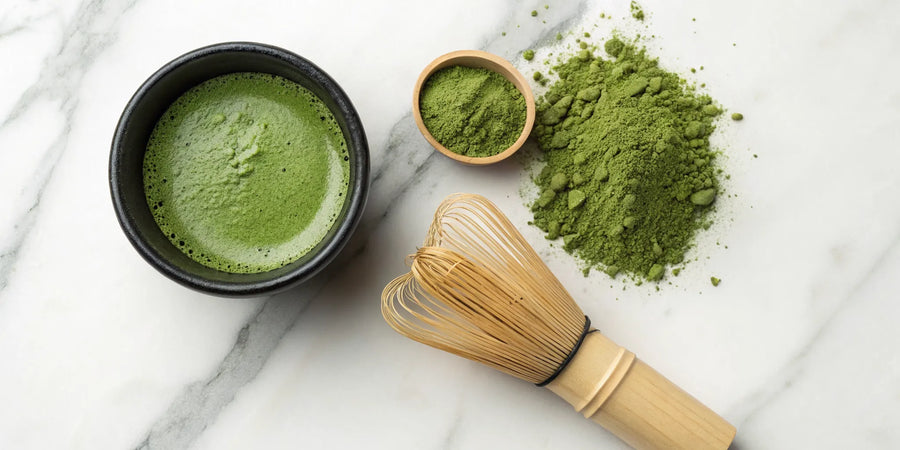 High-quality matcha powder, a traditional bamboo whisk, and vibrant green matcha tea.
